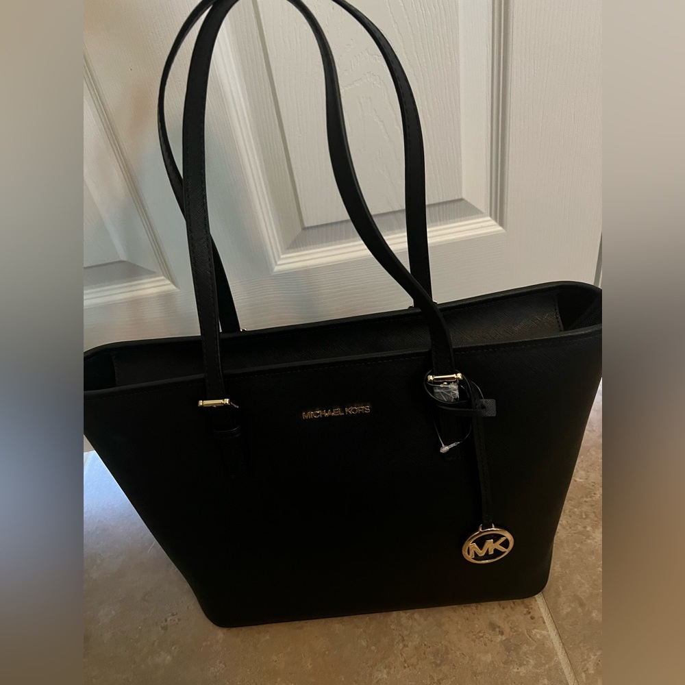 Michael Kors Black purse/bag, brand new never used.